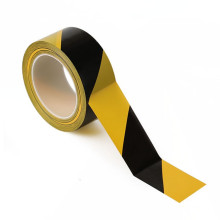 Cinta de la marca de seguridad del PVC del negro amarillo / cinta amonestadora de encargo para la marca del carril